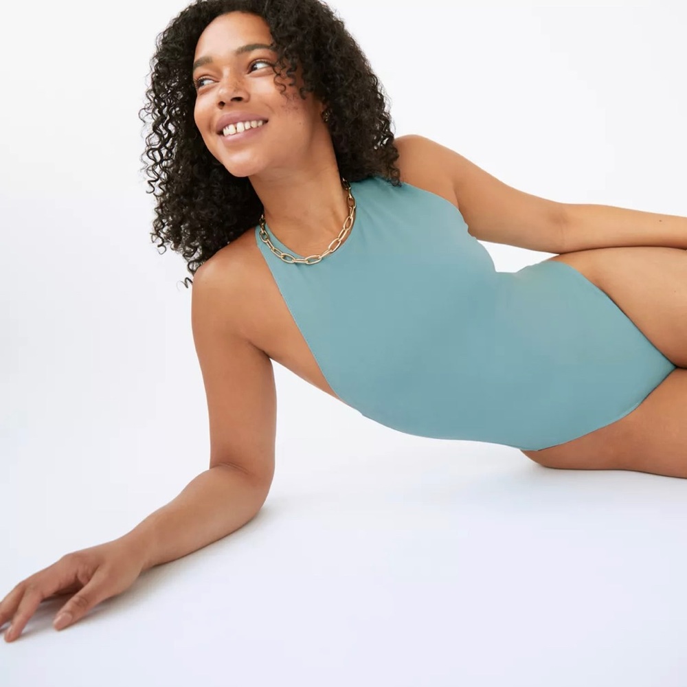 White aritzia cross back bodysuit
